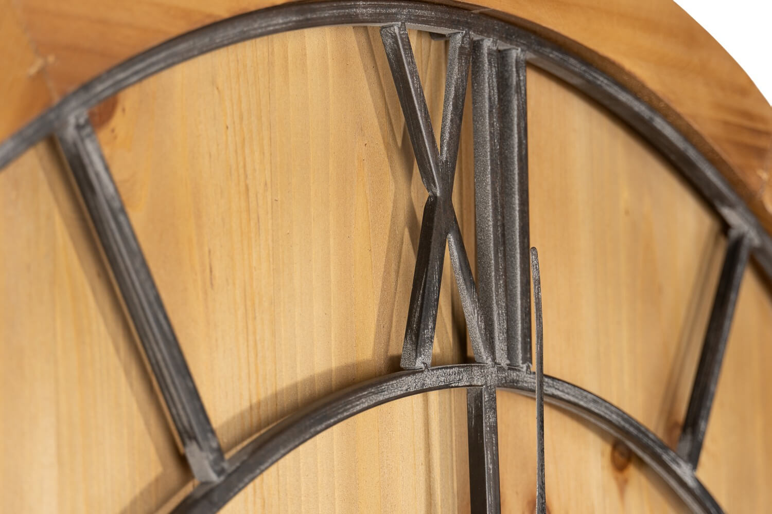 a playful close-up of the wooden clock's grey numerals against the rich brown face