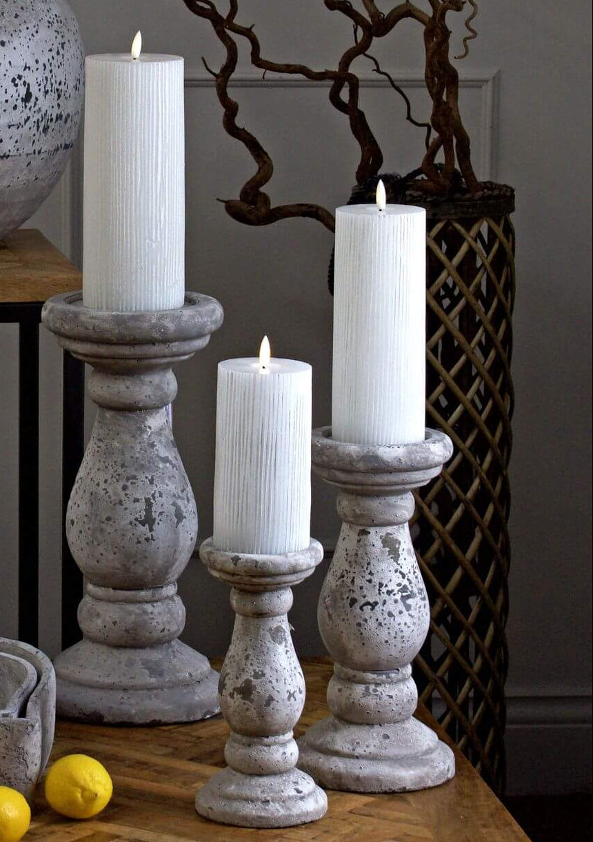 Handcrafted 34cm stone ceramic candle holder with weathered finish for rustic farmhouse or coastal decor. by Sostter at brixbailey.com