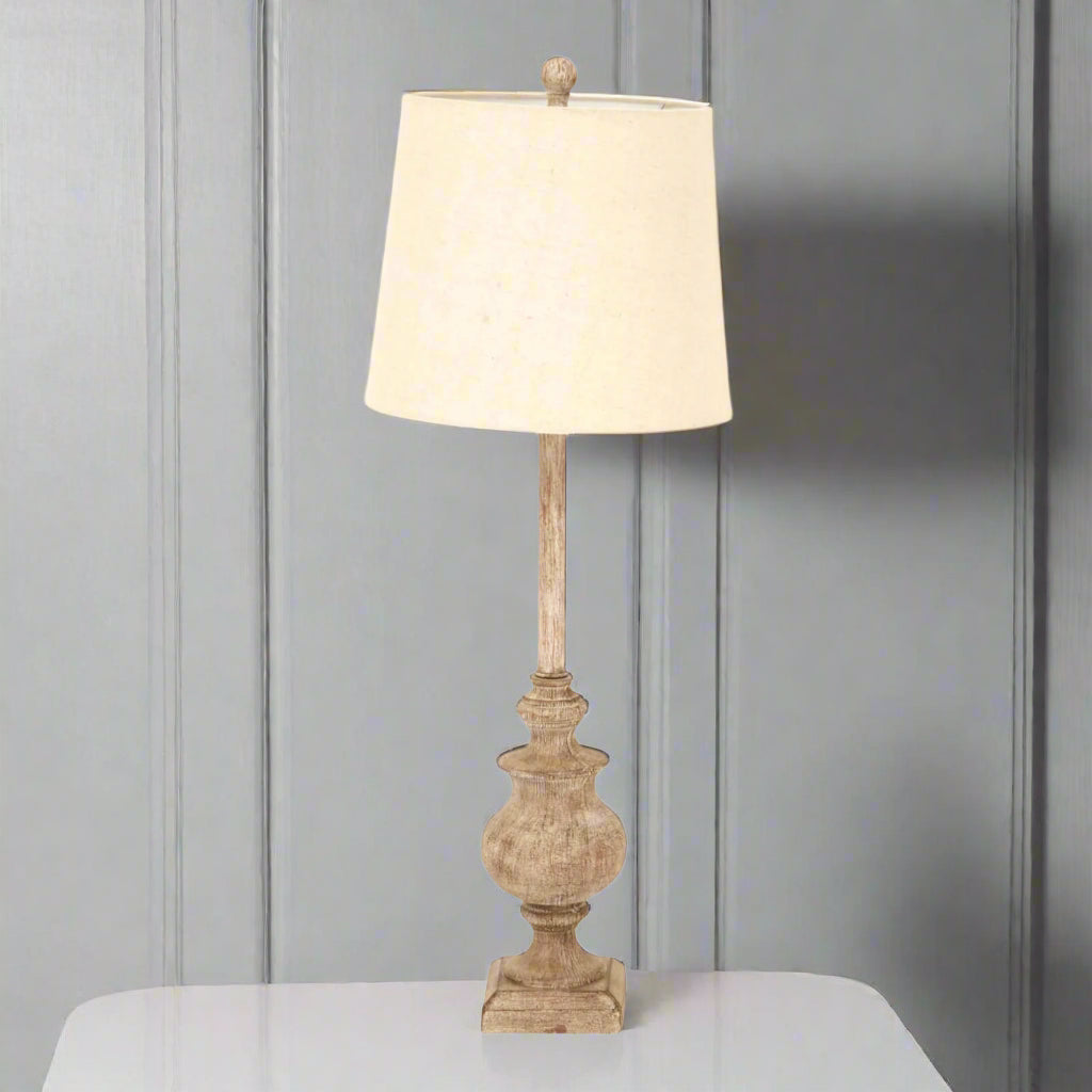 Brown resin candlestick table lamp with linen shade, 80cm tall, for modern or traditional interiors by RoomLondon at brixbailey.com