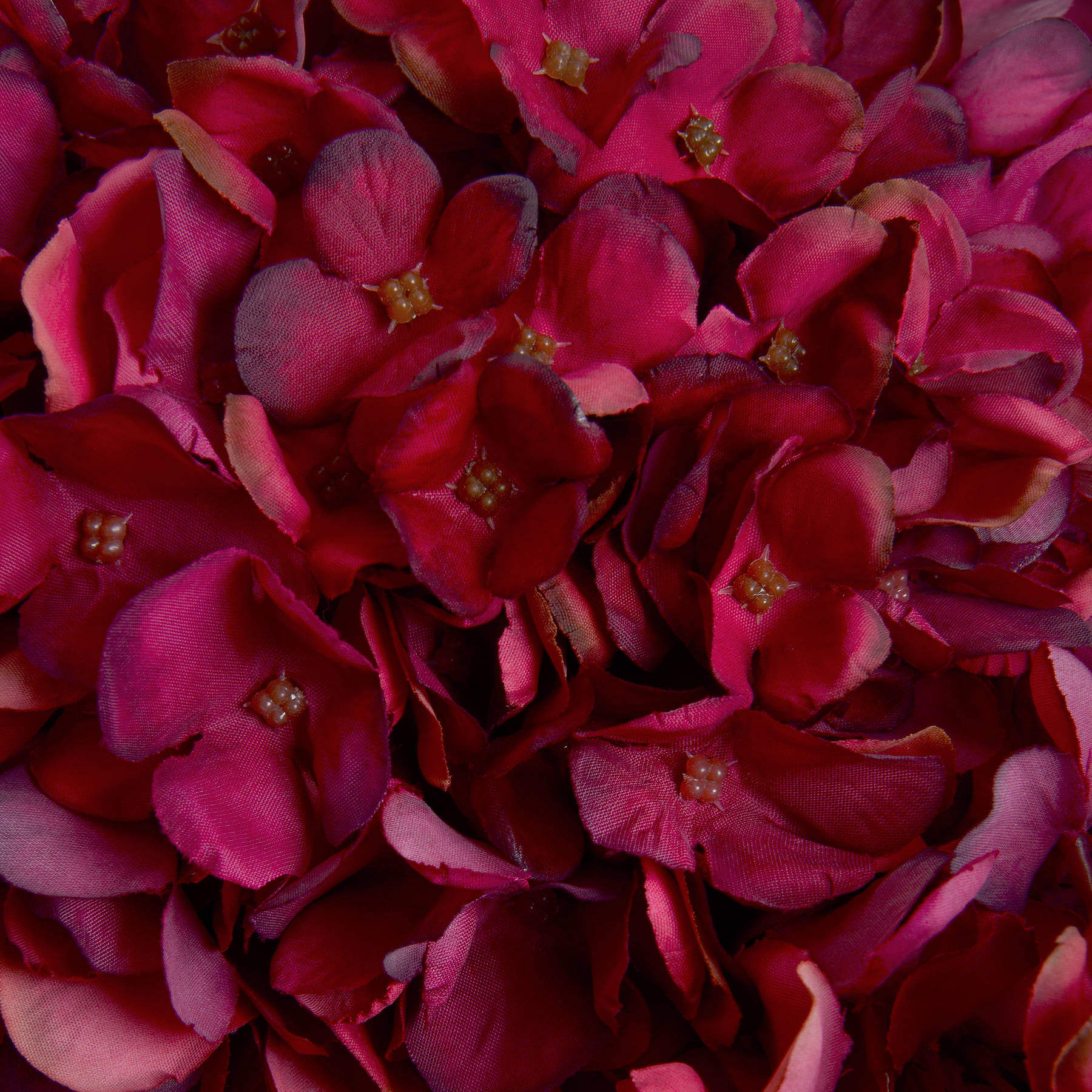 Lifelike ruby red hydrangea stem with hand-painted petals, 42cm tall, perfect for home decor or floral arrangements by Sostter at brixbailey.com