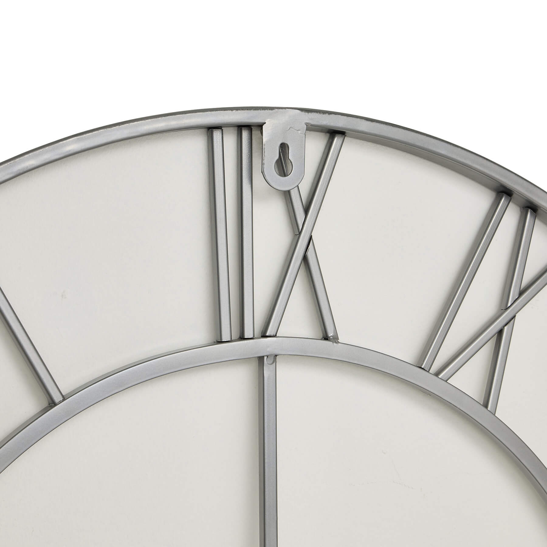 Silver skeleton wall clock with exposed mechanics, 70cm diameter, modern metal design for home or office decor by Sostter at brixbailey.com