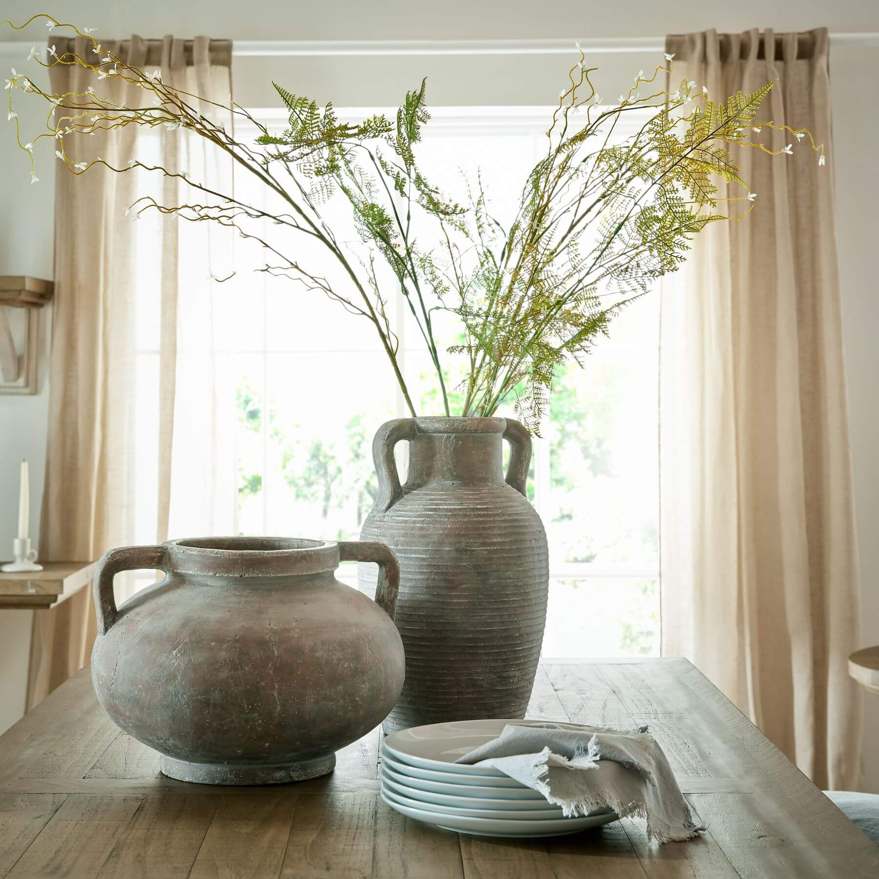 Siena Brown Pelike Pot, handcrafted ceramic vase with distressed finish and double handles in rich terracotta tones. by Sostter at brixbailey.com