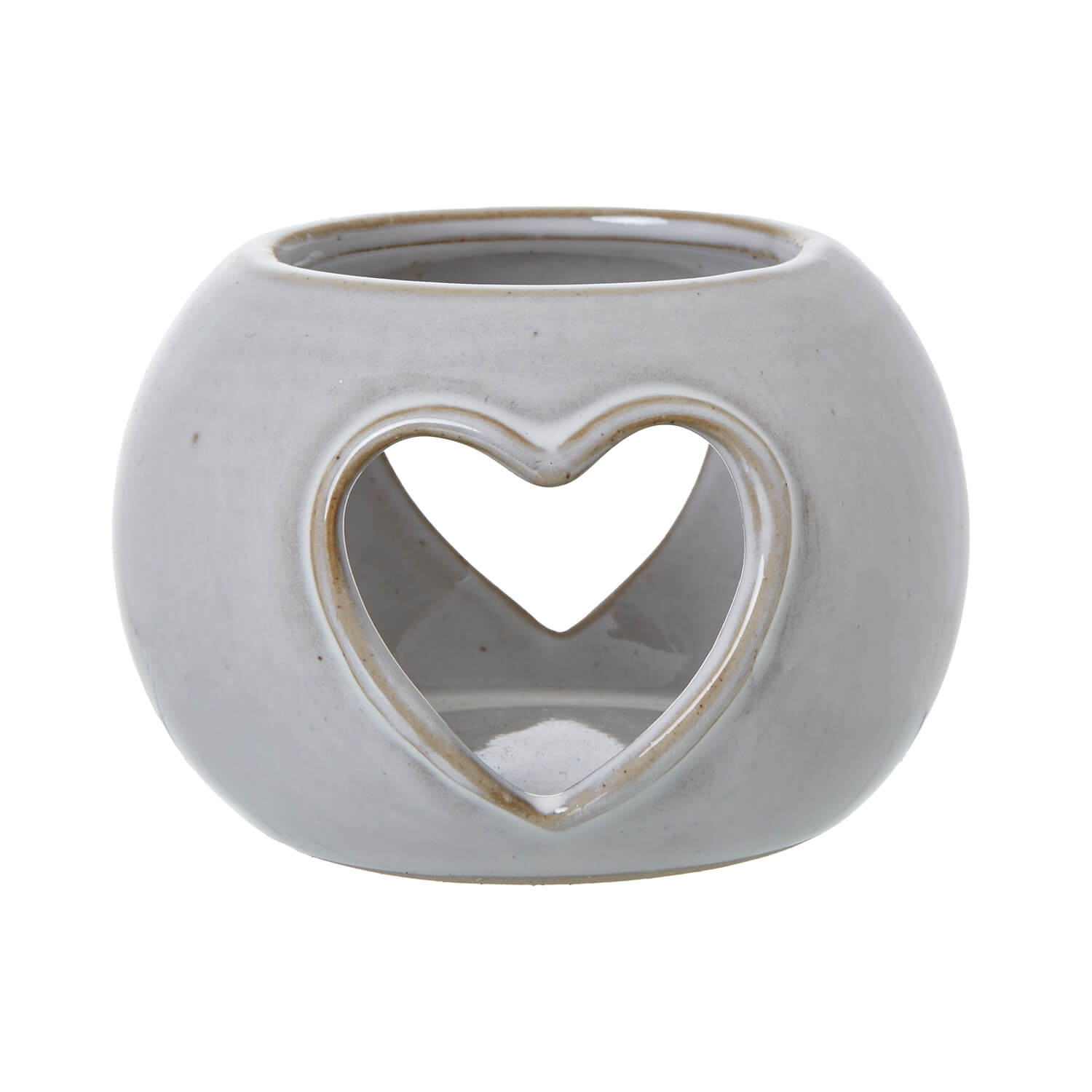 White ceramic tealight holder with heart-shaped cutouts, creating warm ambient light patterns for cozy decor by sostter at brixbailey.com
