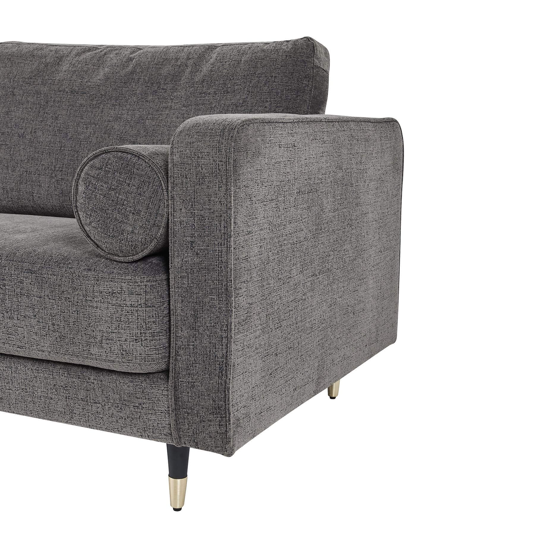 Grey fabric armchair with plush upholstery and curved arms, blending modern elegance with classic comfort for any living space. by sostter at brixbailey.com