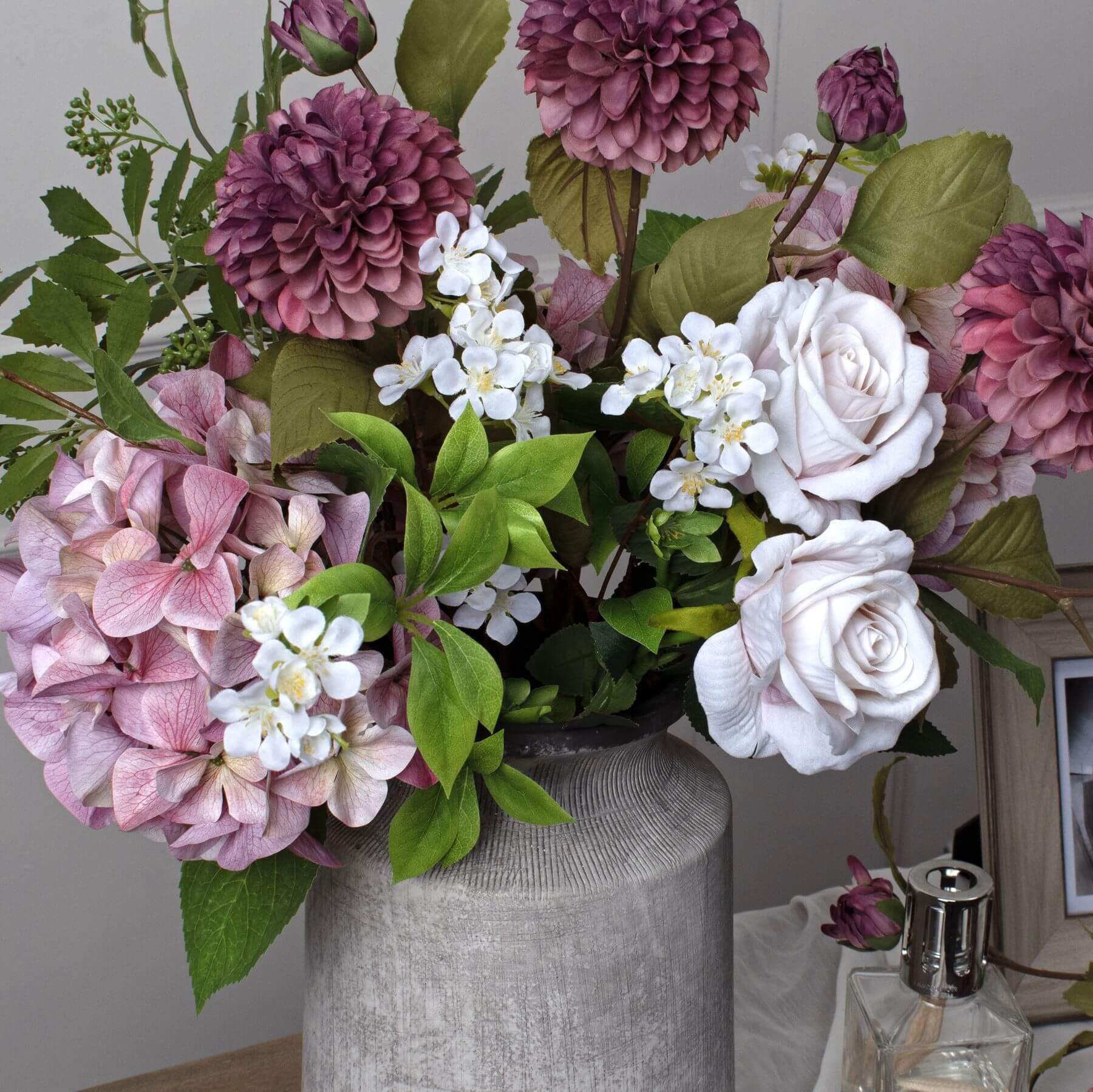 Handcrafted stone-effect urn vase in neutral tones, weathered ceramic texture, modern organic decor centerpiece. by Sostter at brixbailey.com