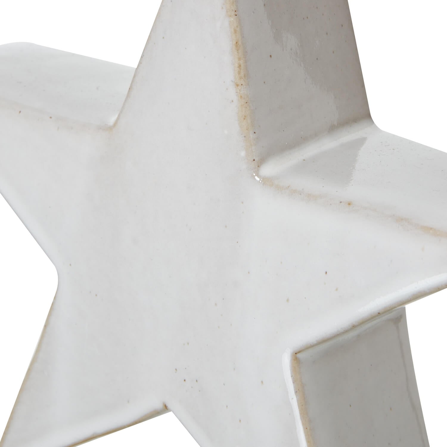 Handcrafted matte white ceramic star ornament with Scandinavian minimalist design for winter holiday decor by sostter at brixbailey.com