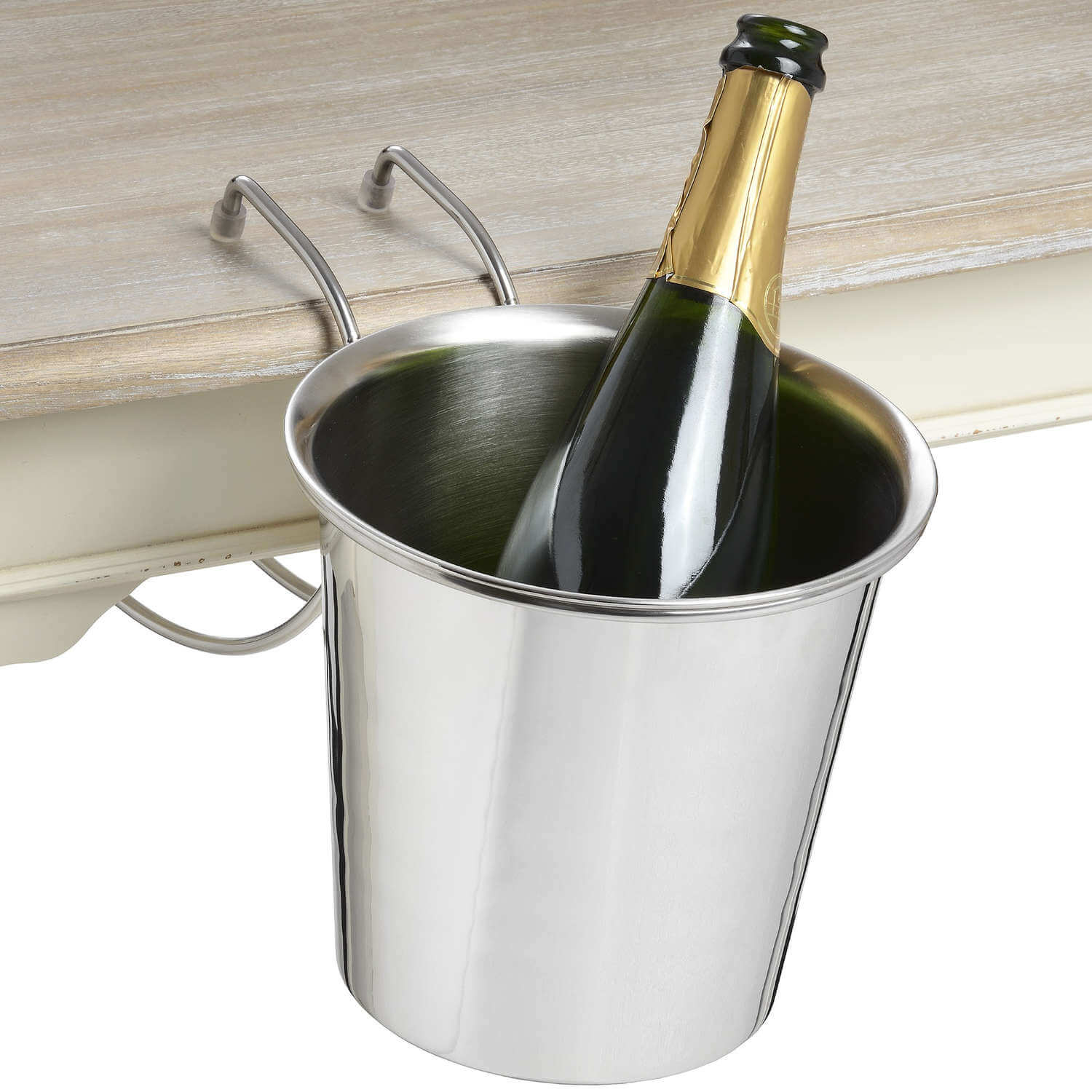Silver stainless steel hanging champagne bucket with curved arm, space-saving table-edge design for elegant chilling. by Sostter at brixbailey.com