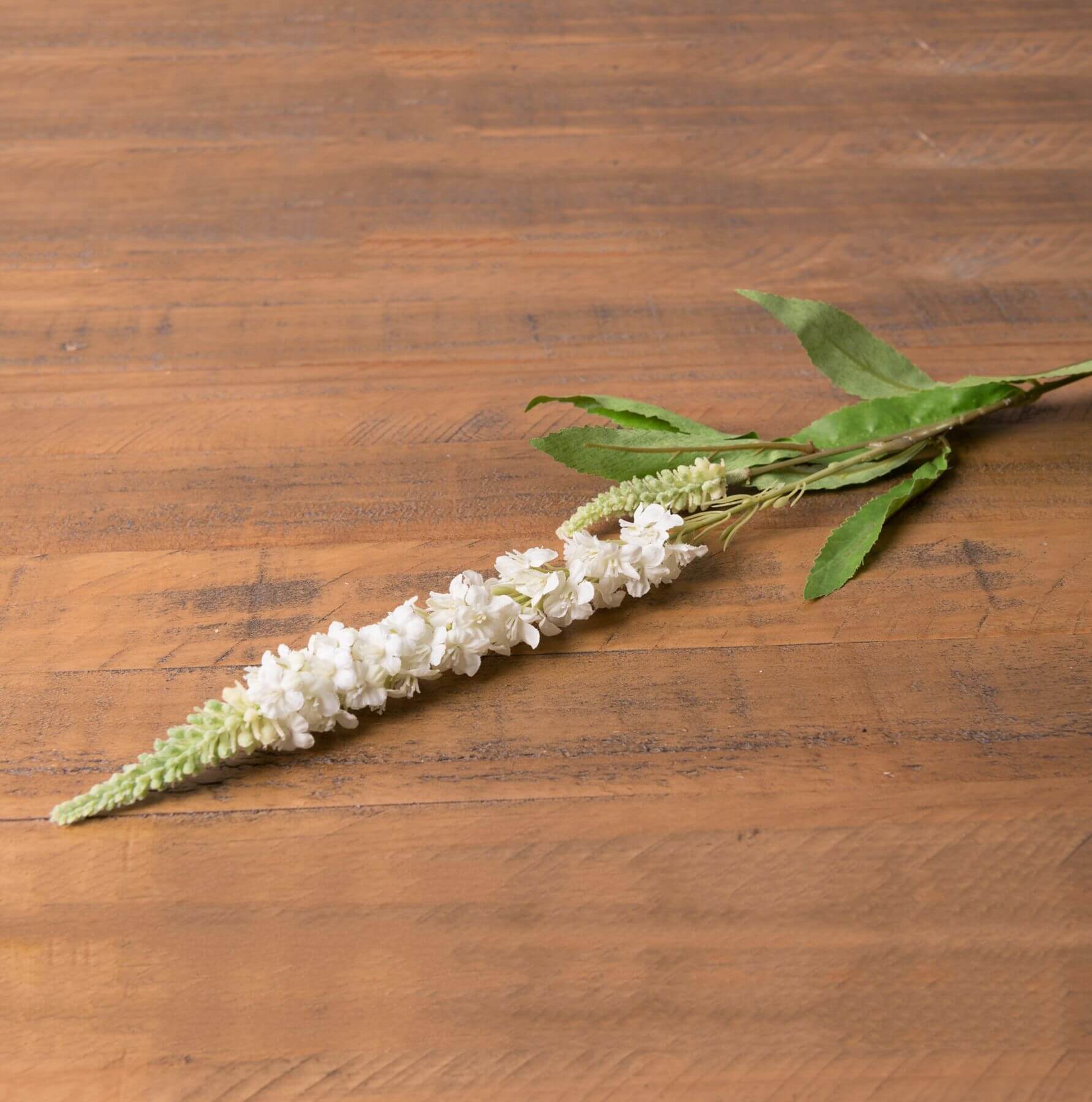 Lifelike white Veronica artificial flower stem with realistic petals, perfect for floral arrangements and home decor. by Sostter at brixbailey.com