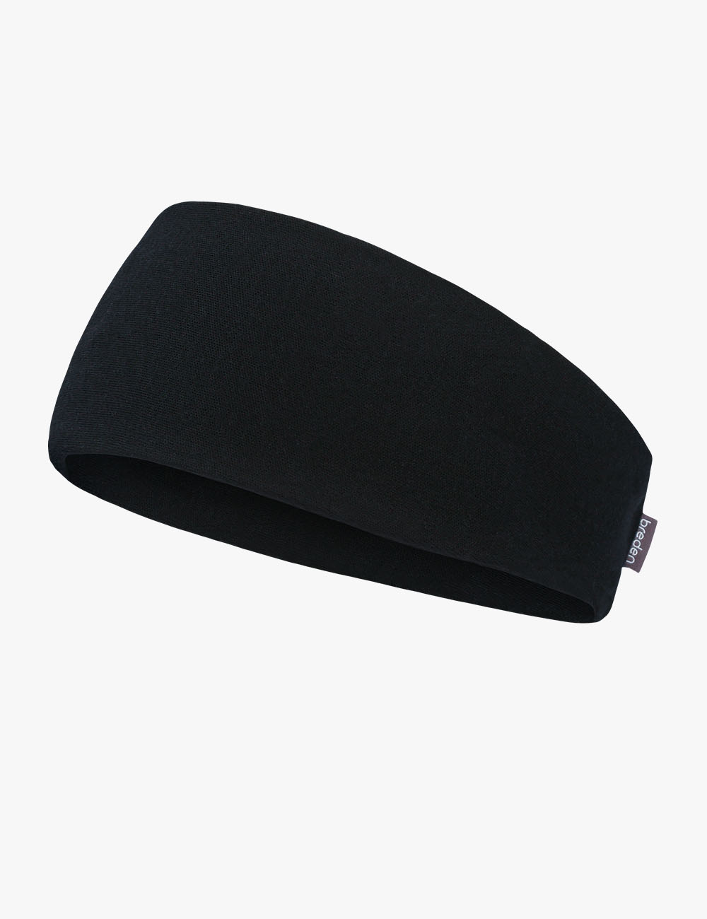 bold close-up of a merino wool headband for sports on an active adult in a rugged outdoor setting