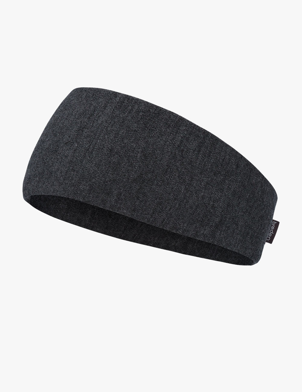 a soft merino wool headband for hiking in cool weather, shown in a cozy indoor setting