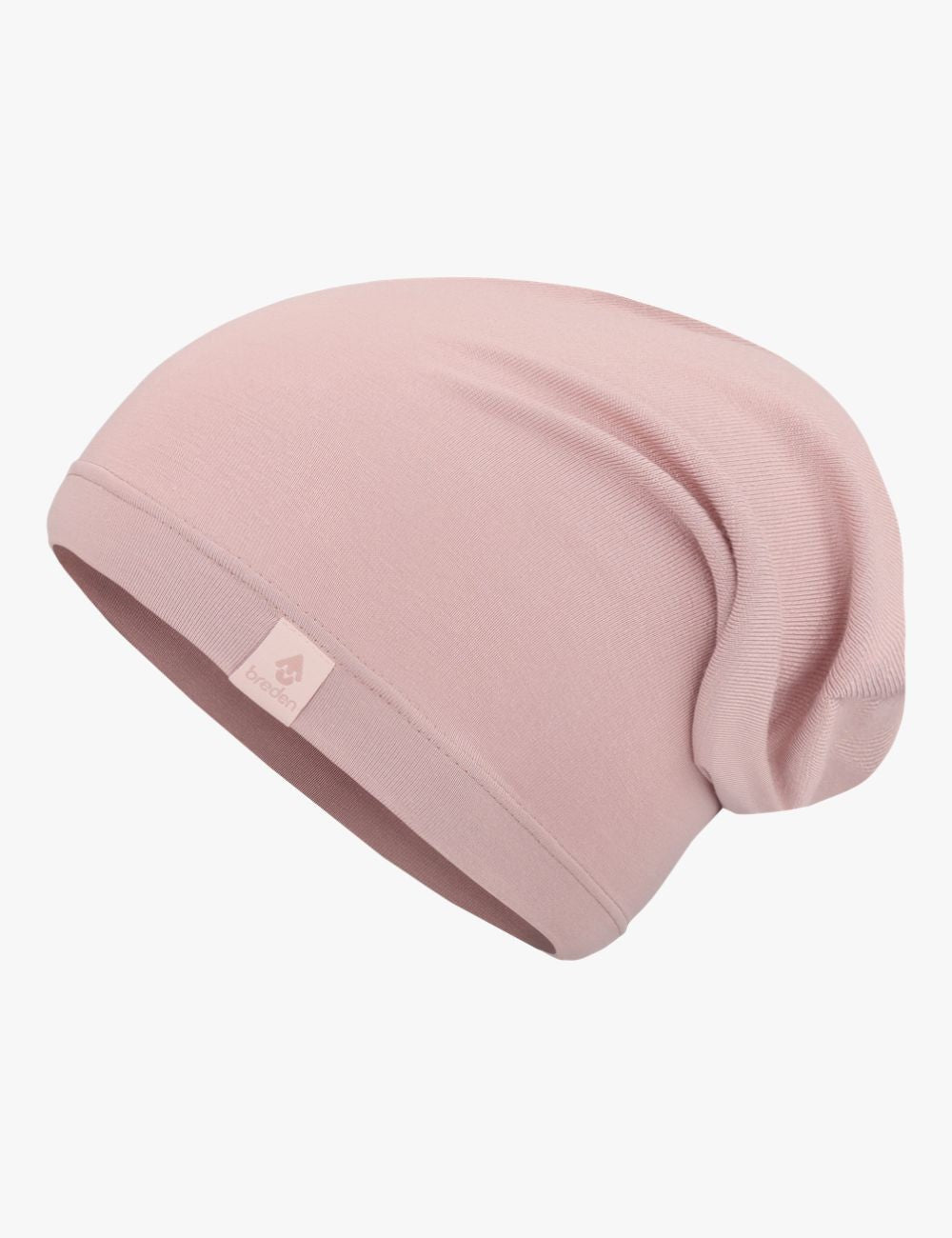 a child's sustainable bamboo viscose beanie packed into a pocket, ready for adventure