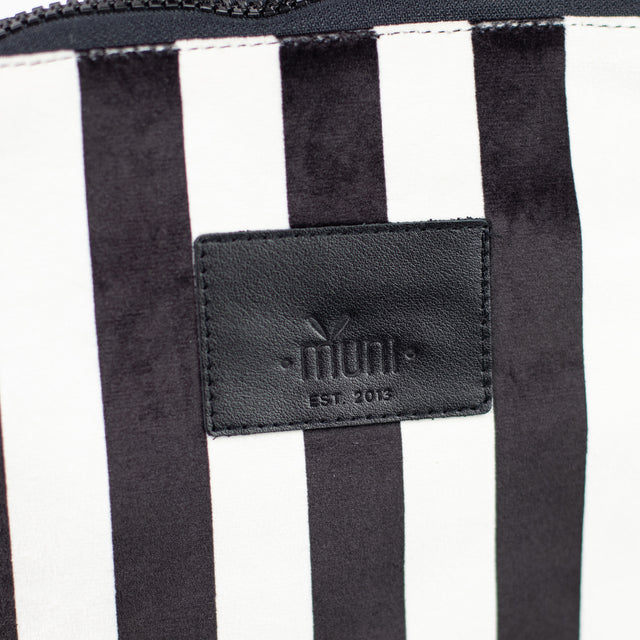 Chic Striped Backpack – Stylish & Functional Design by Muni at www.brixbailey.com