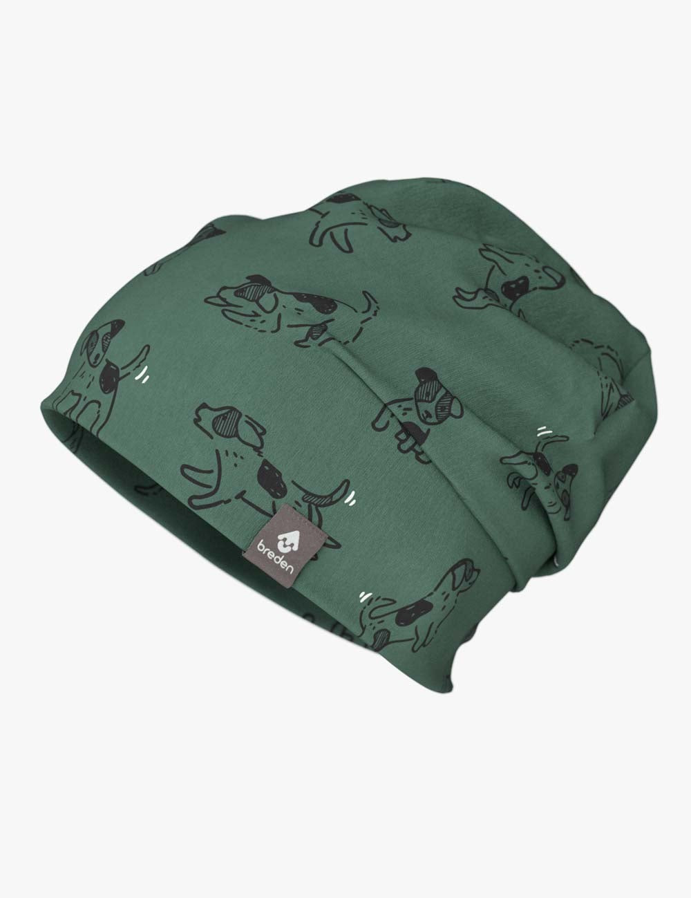 a soft green cotton beanie with a playful dog pattern, shown in gentle morning light