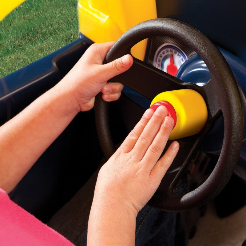 functional view of cozy truck ride-on toy with open tailgate for toy storage