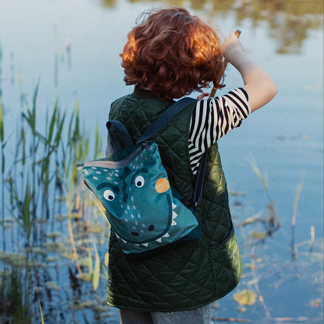 Kids Dinosaur Backpack – Fun & Functional for Adventures by Muni at www.brixbailey.com