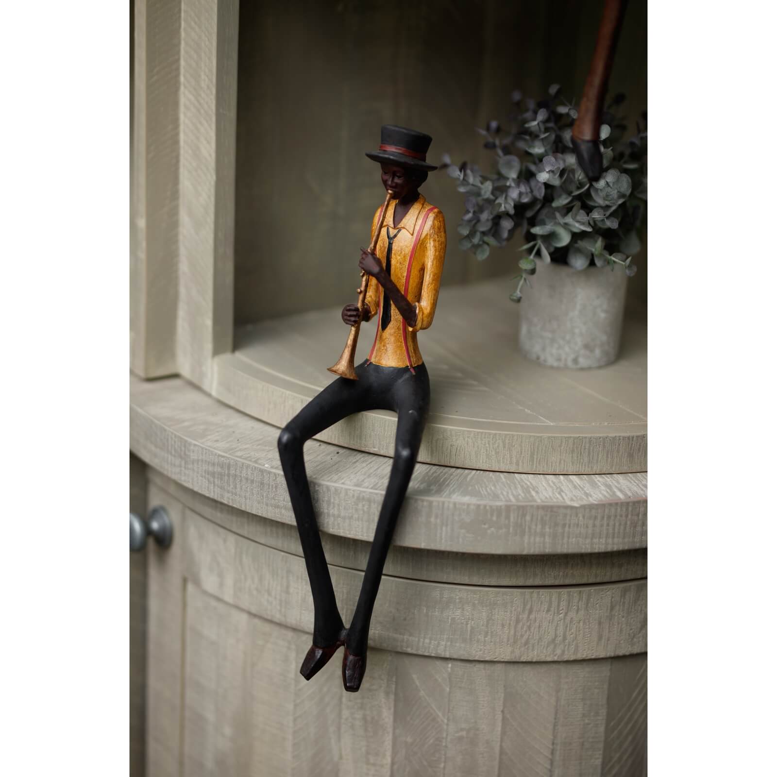 Handcrafted brown resin jazz trumpeter sculpture, 39cm tall, with vintage charm for home decor by Sostter at brixbailey.com