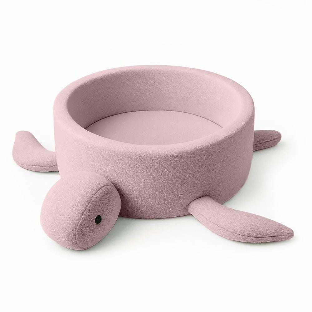 soft pink boucle turtle ball pit for baby, a cozy sensory play haven in warm morning light