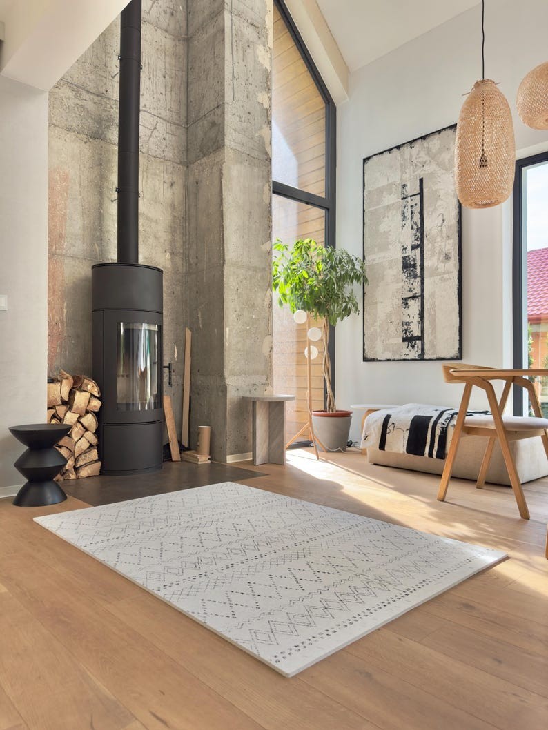 a close-up of the boho foam playmat's textured surface in soft, neutral tones, elegantly lit