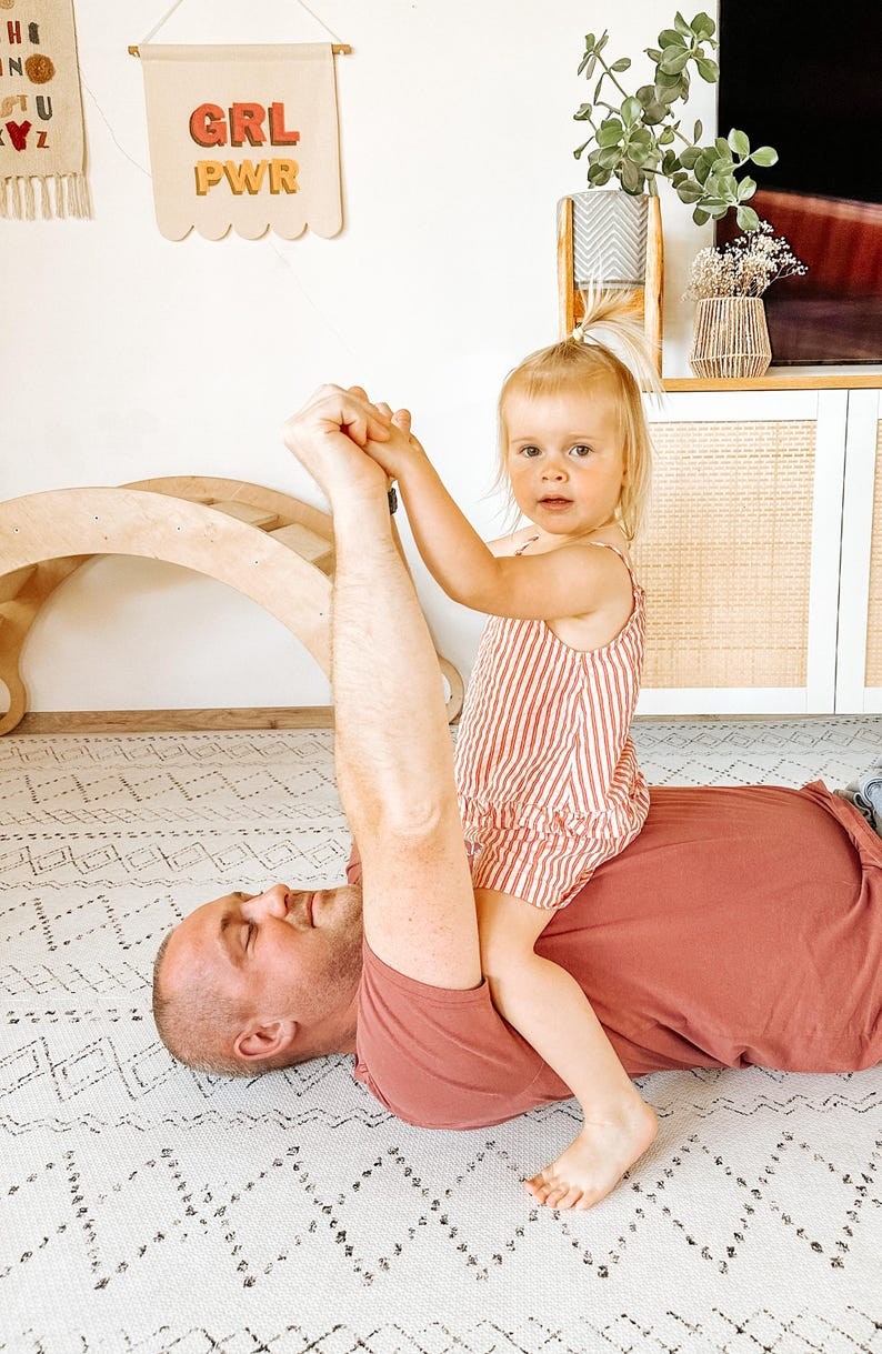 a close-up detail of the soft boho foam playmat tiles, showcasing their neutral pattern and safe, wipe-clean surface