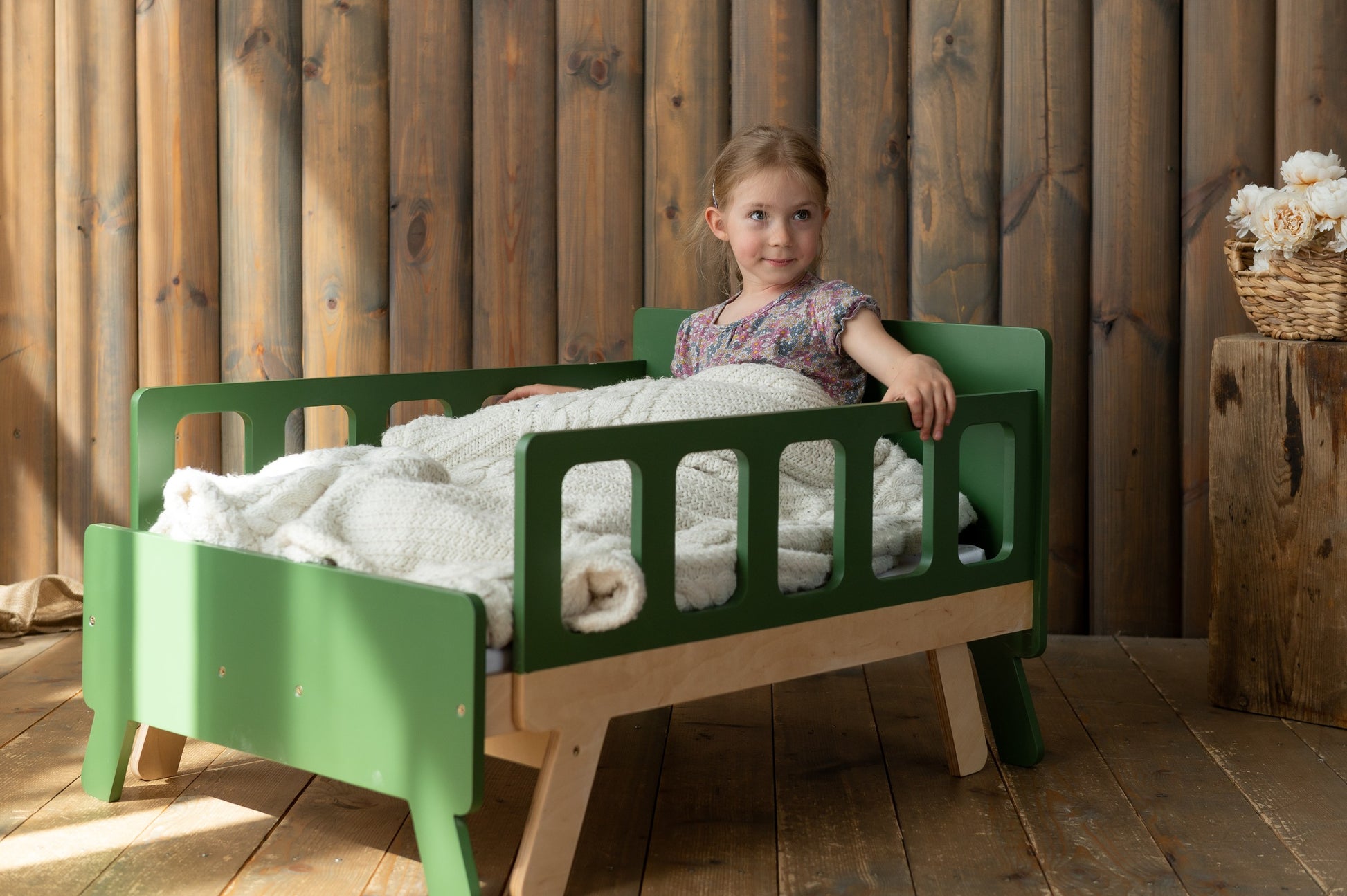 versatile kids growing bed transformed into a cozy sofa with armrests for playtime