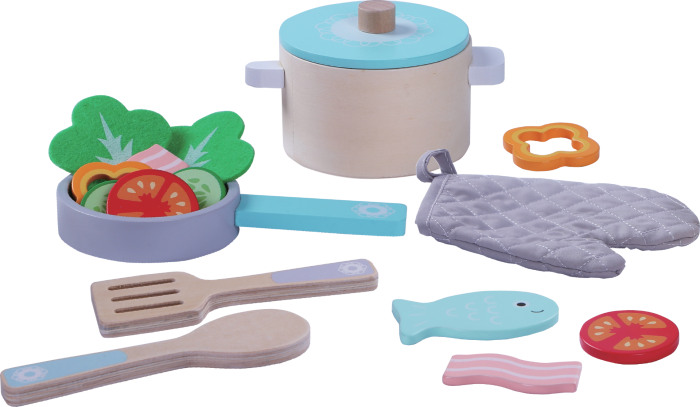 soft-lit wooden cooking set with vibrant play food on a cozy kitchen counter