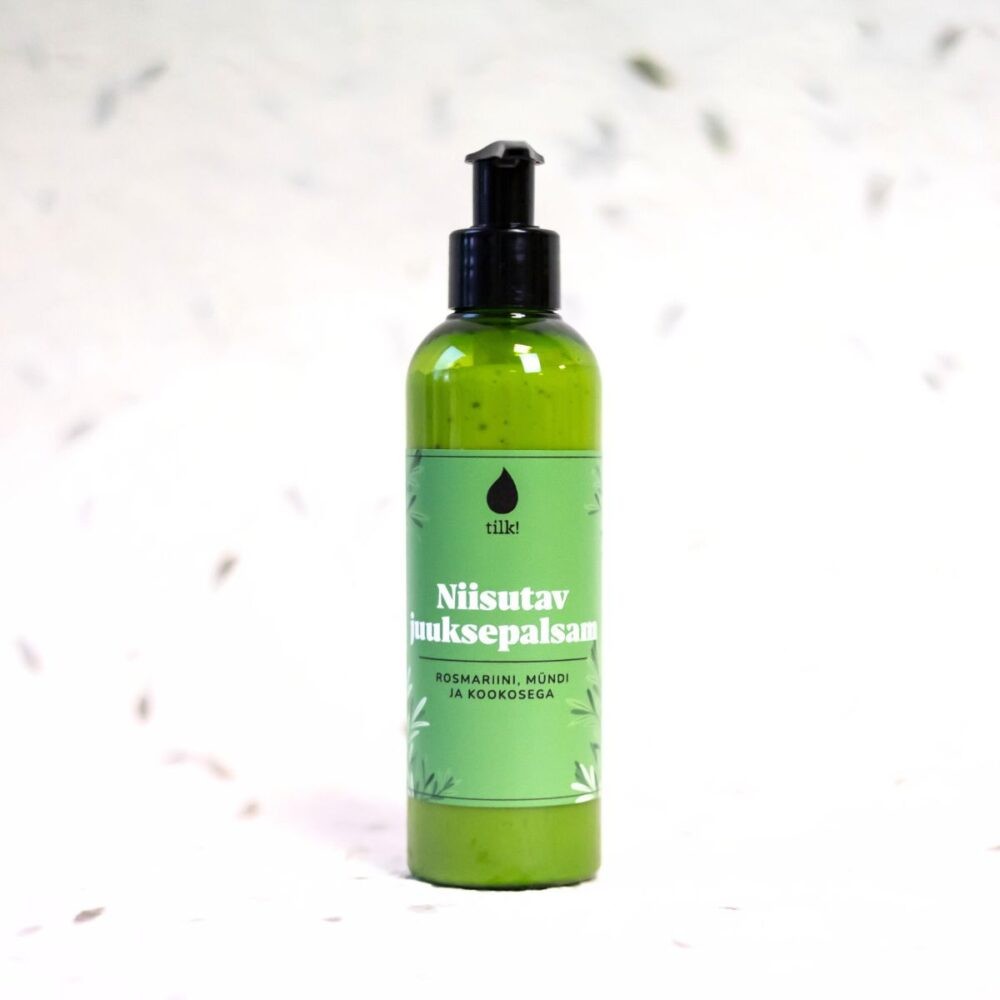bold mint-rosemary-coconut hair conditioner bottle with dew drops, fresh green leaves in background