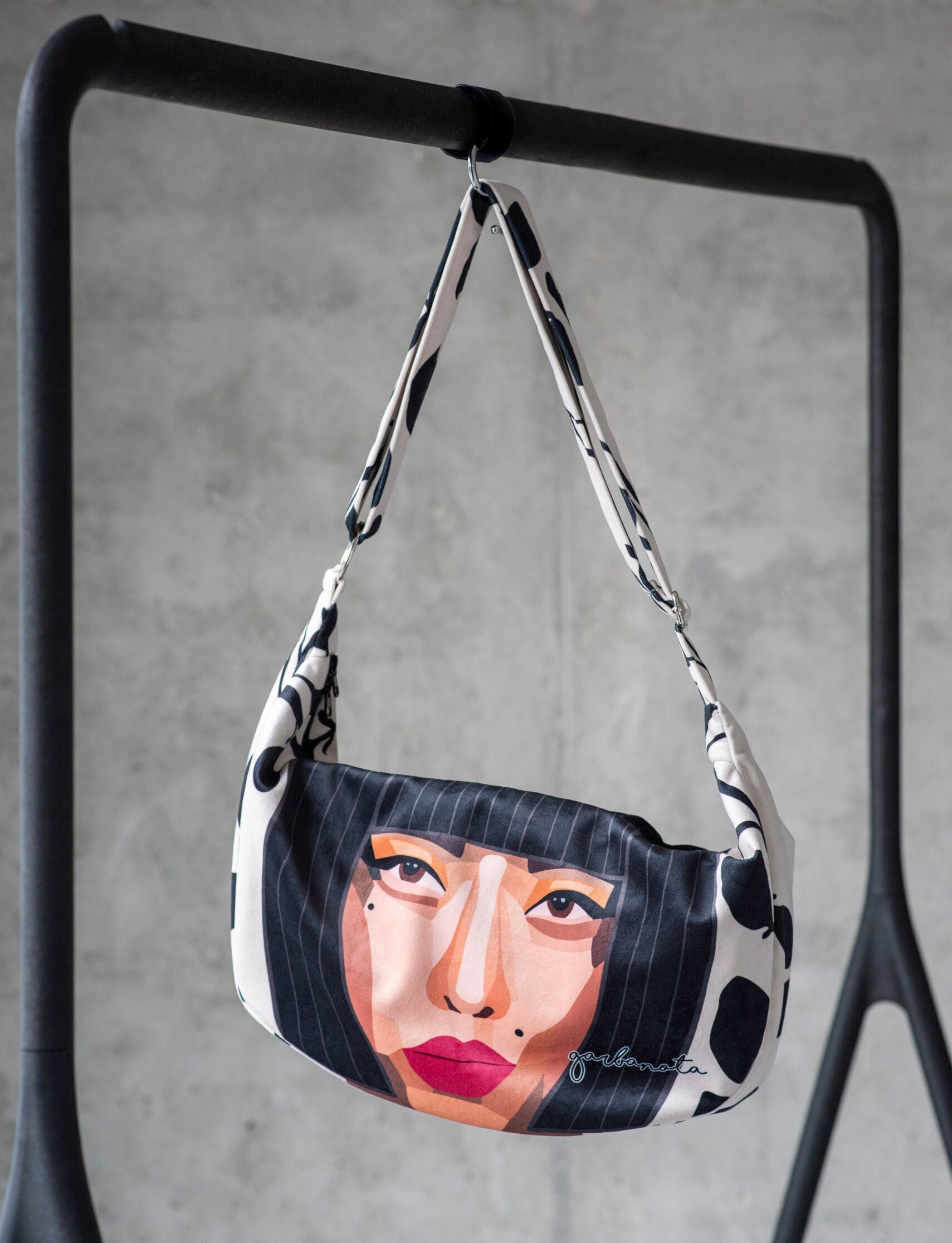 soft velour hobo bag in a comforting morning light, showing its slouchy shape and smooth texture