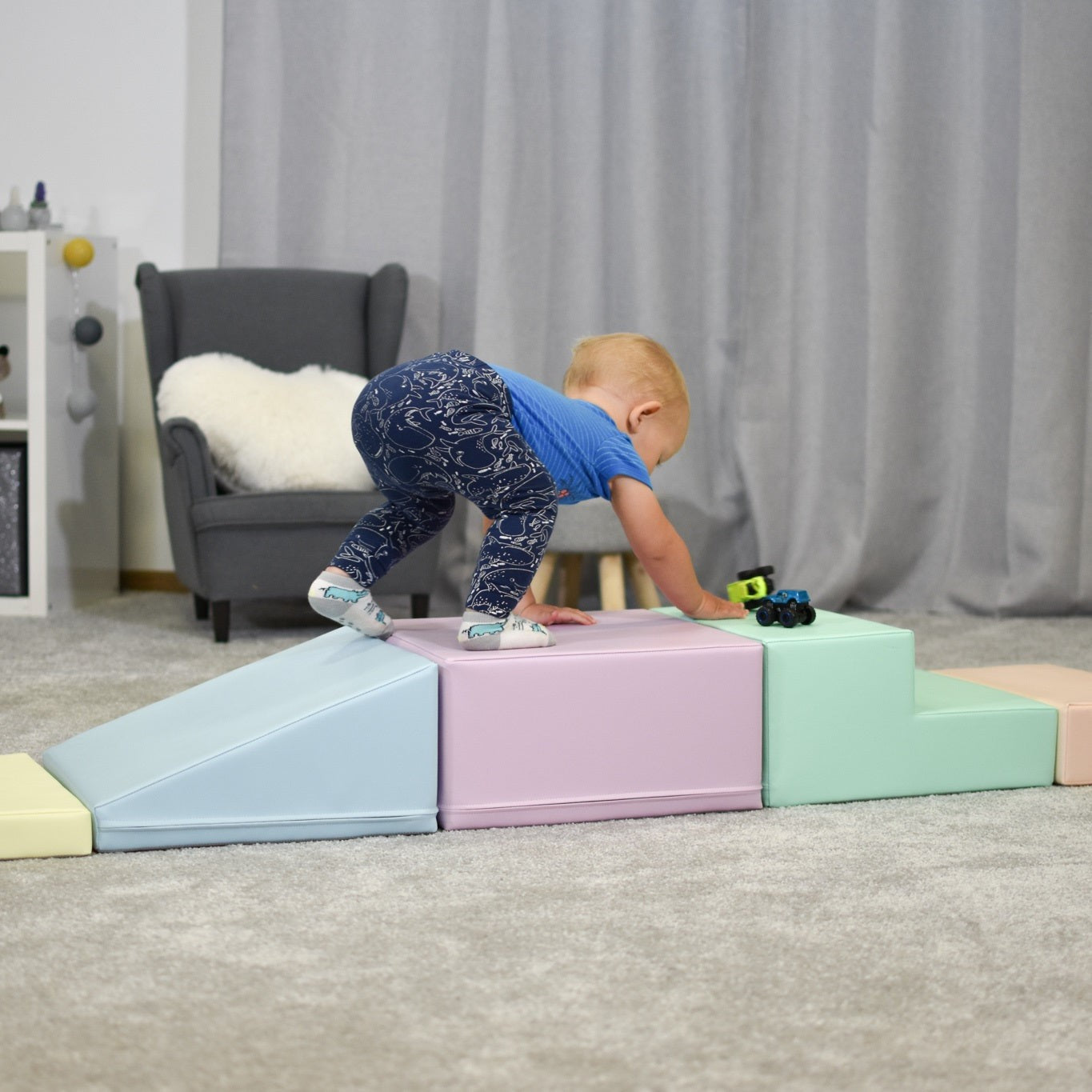 elegant pastel foam climber set arranged in a sophisticated nursery corner