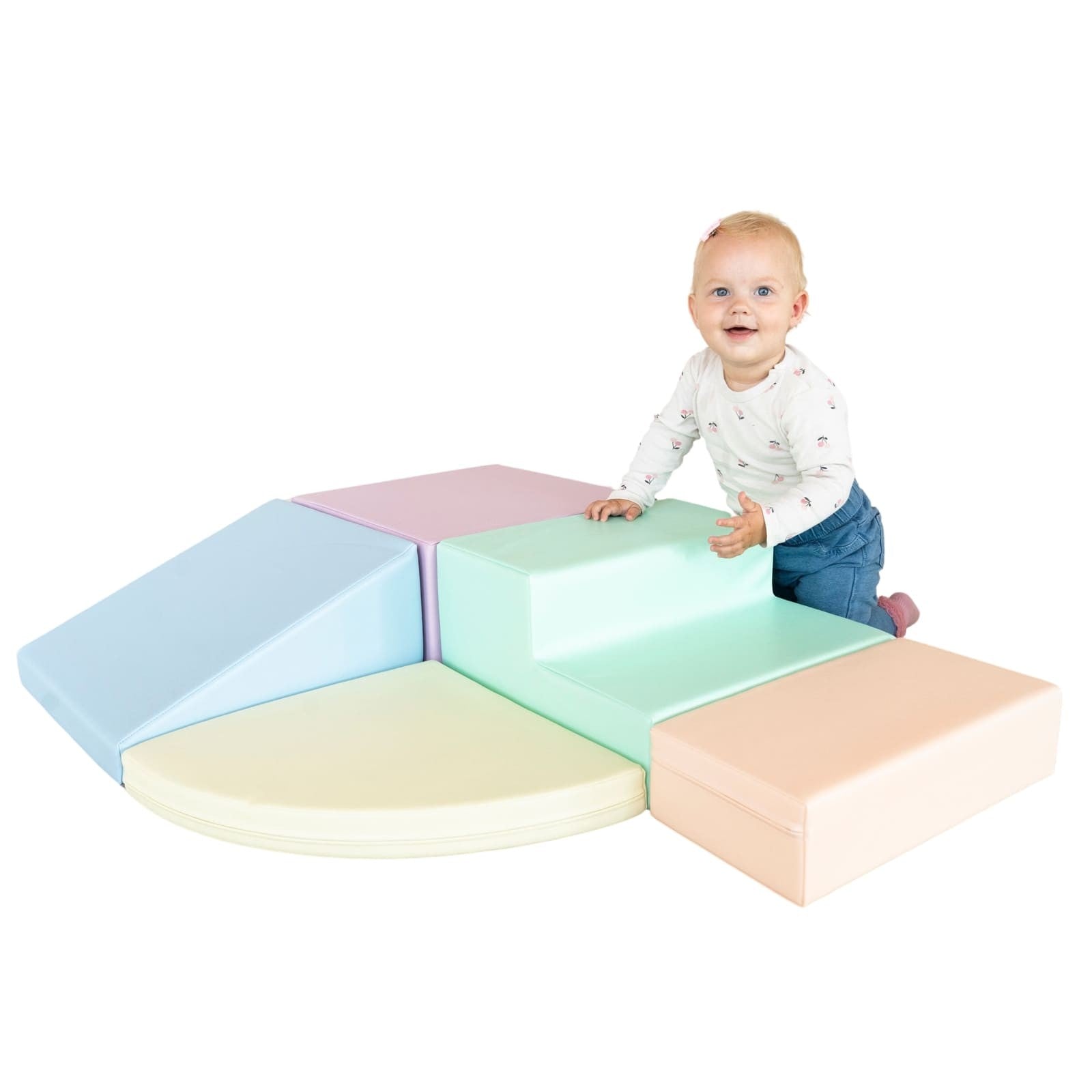 a toddler climbing on a soft pastel foam corner climber in a bright, sunlit playroom