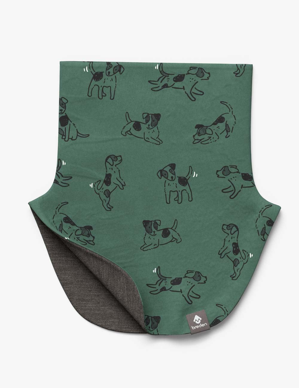 bold close-up of a kids green dogs merino neck warmer in dramatic light