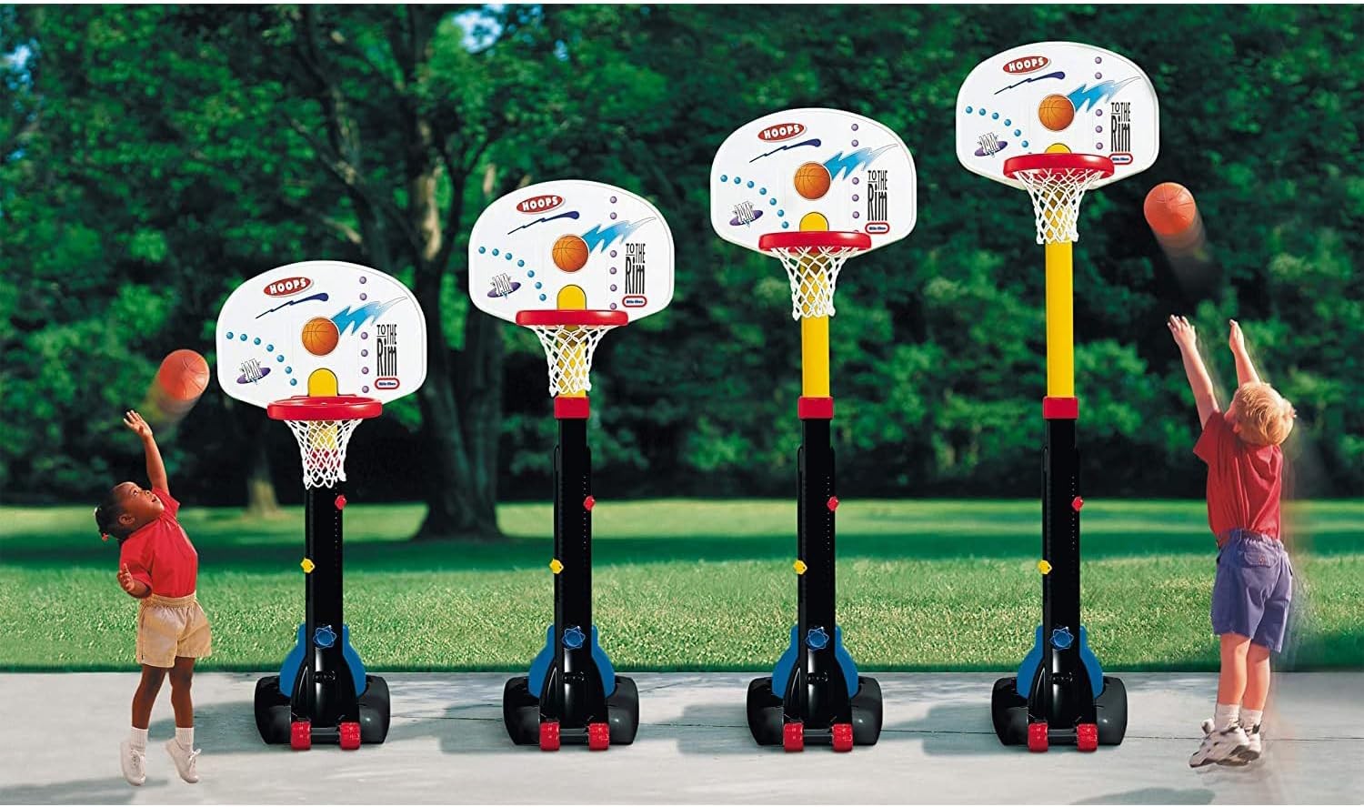 bold adjustable basketball hoop for kids with vibrant orange rim and sturdy base in sunny driveway