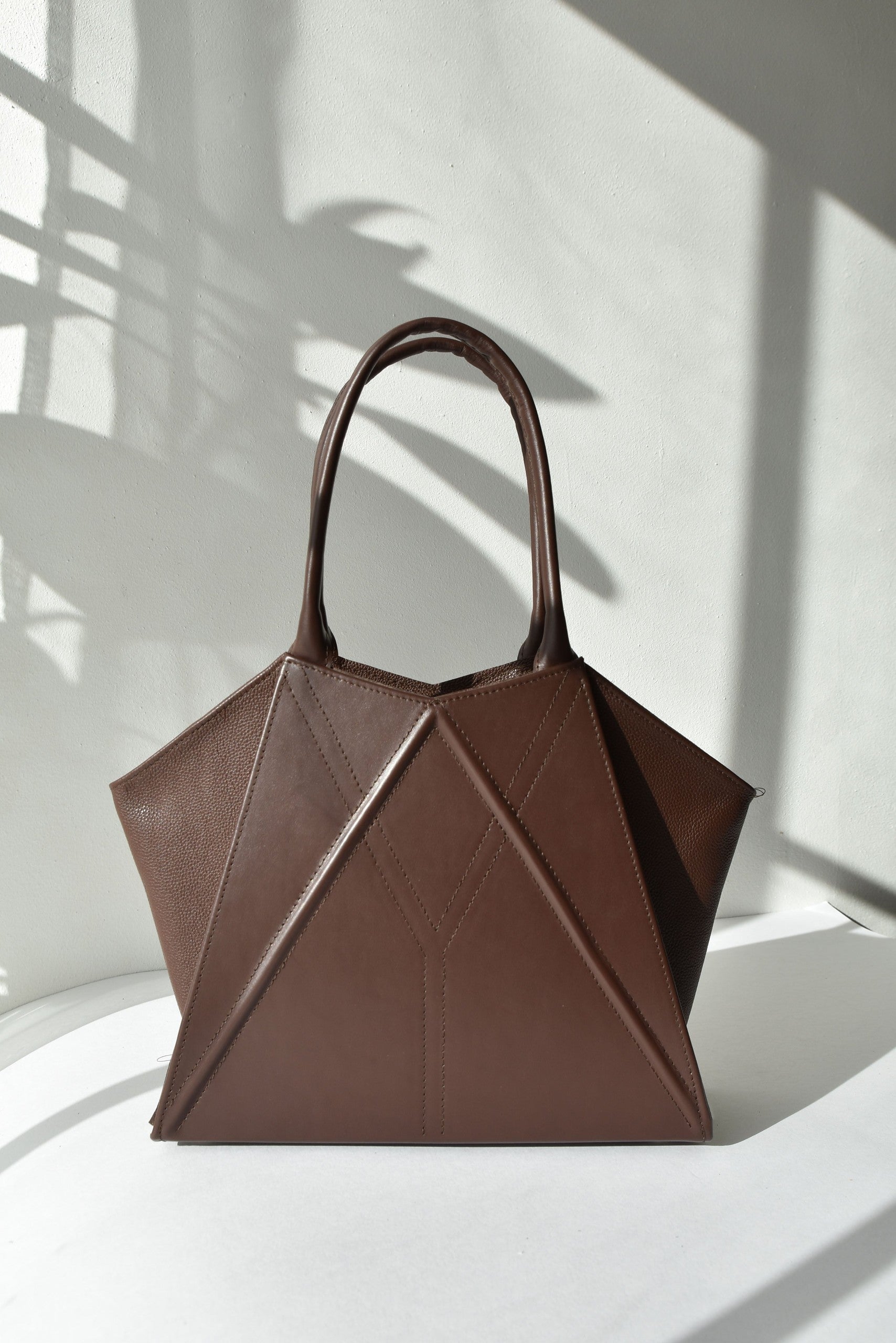 gerda retter handmade leather tote bag open showing inner zipper pocket and magnetic closure