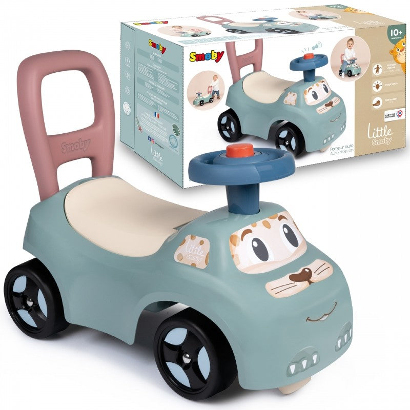 smoby pastel ride-on pusher with horn and storage, shown from a side angle on a wooden floor, practical for toddlers learning to walk