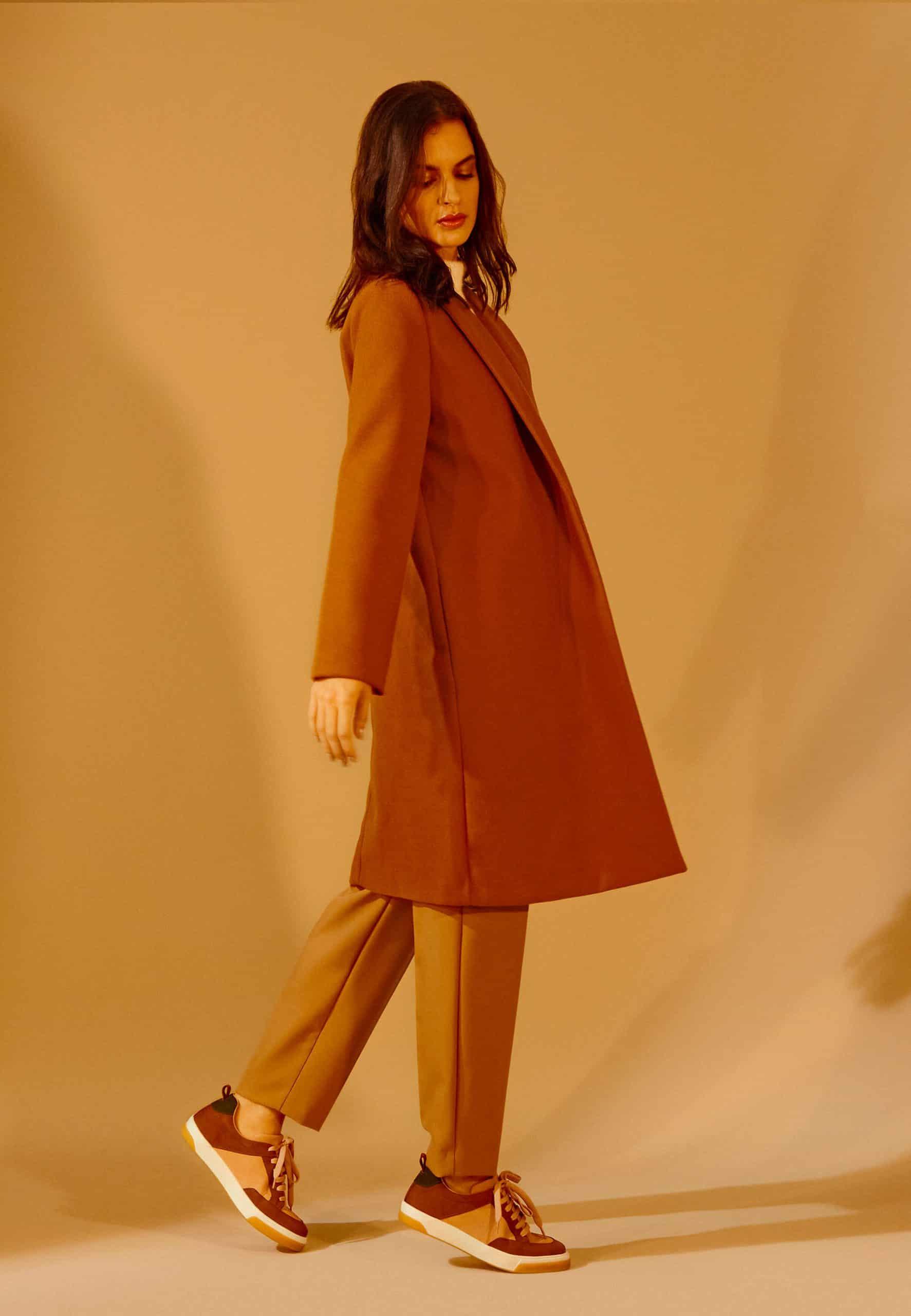 elegant beige andira leather sneakers with a warm brown and orange color palette