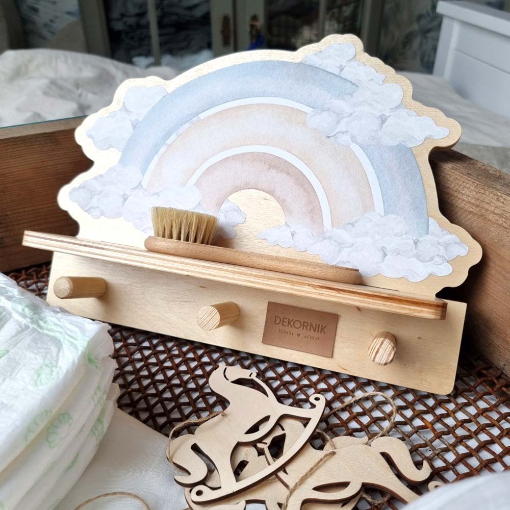 elegant blue rainbow wall shelf with a whimsical dinosaur print, shown in soft natural light
