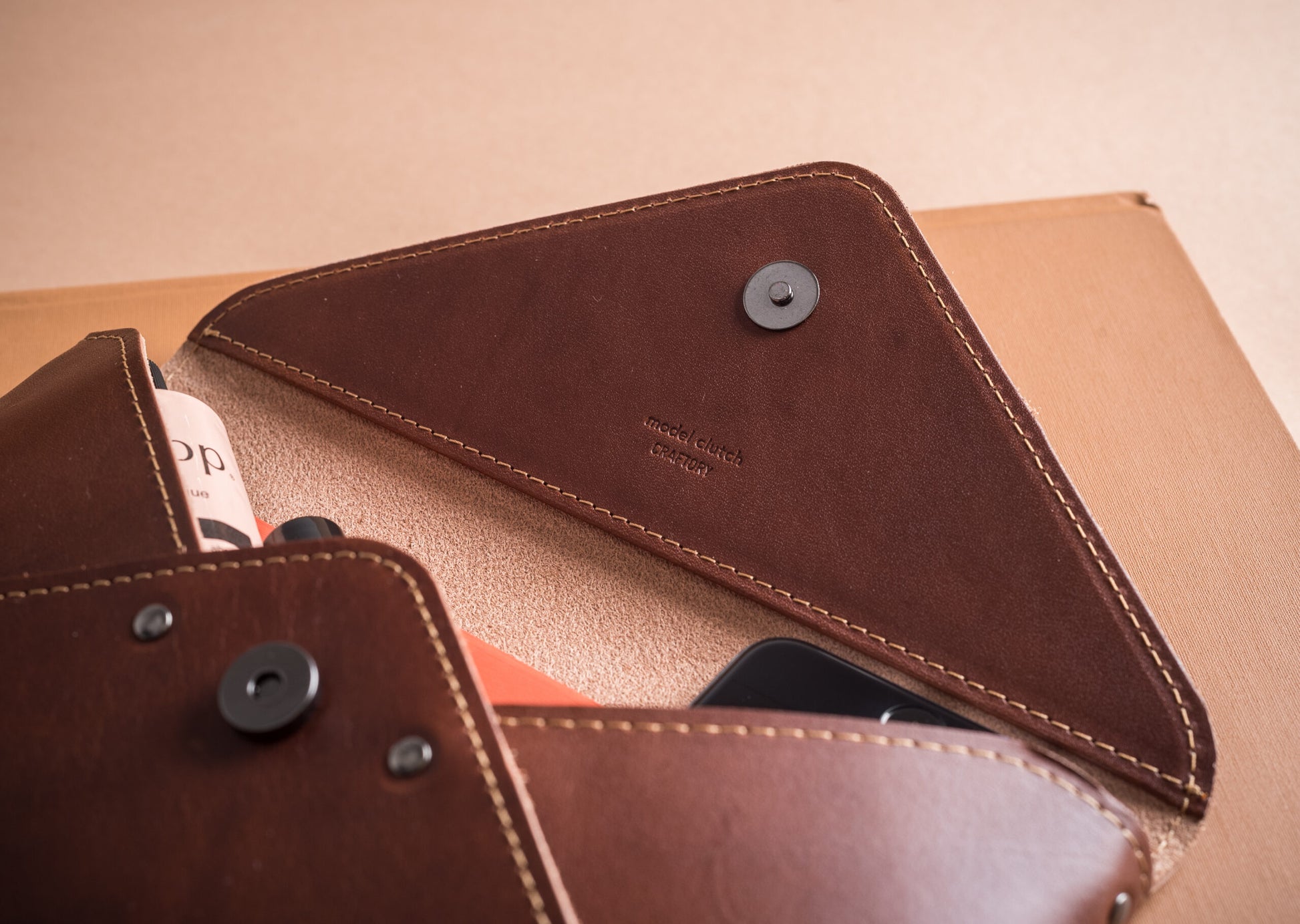 Model Leather Clutch – Chic Minimalist Elegance & Versatility by Craftory at brixbailey.com