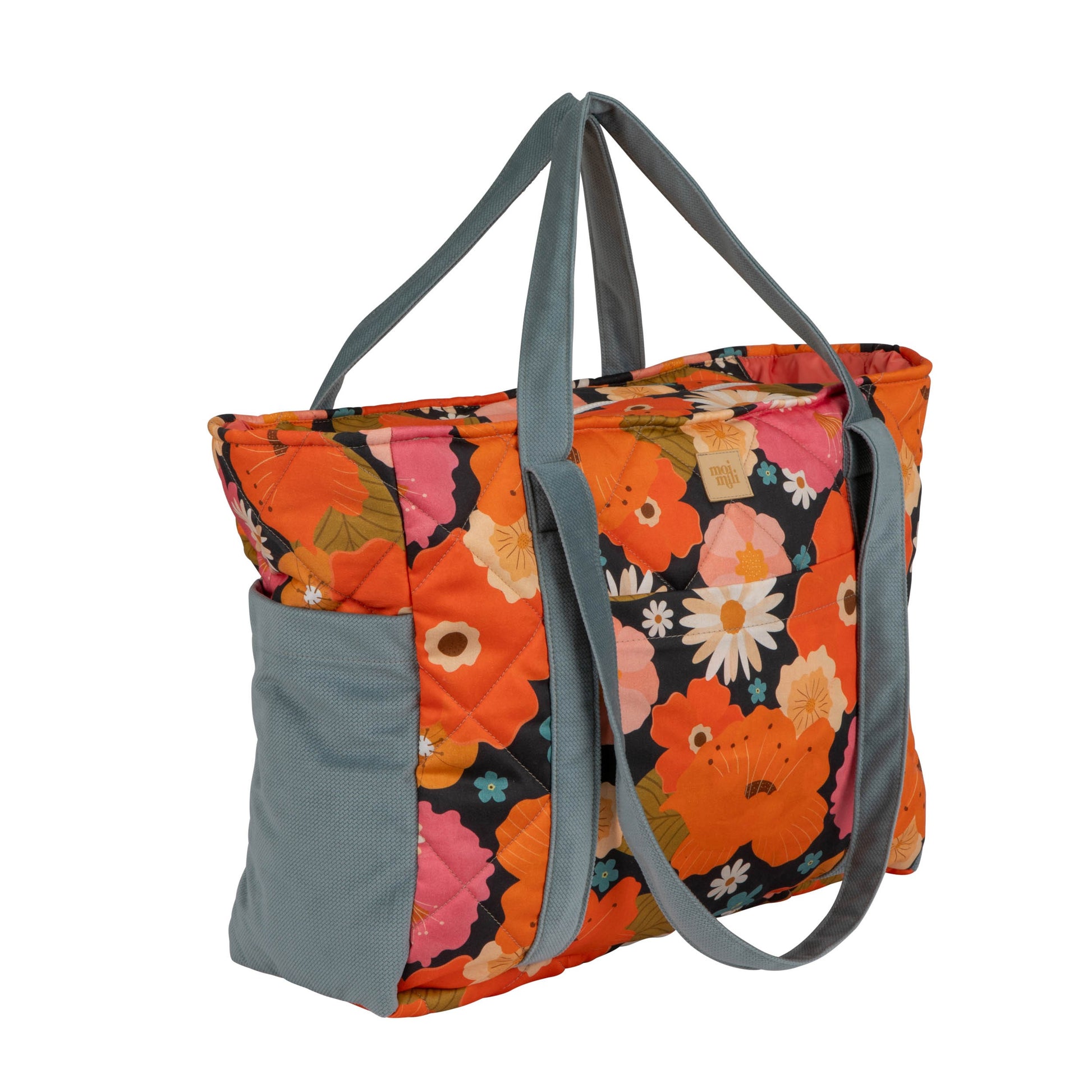 practical floral weekender bag open to show its multiple inner and outer organizational pockets