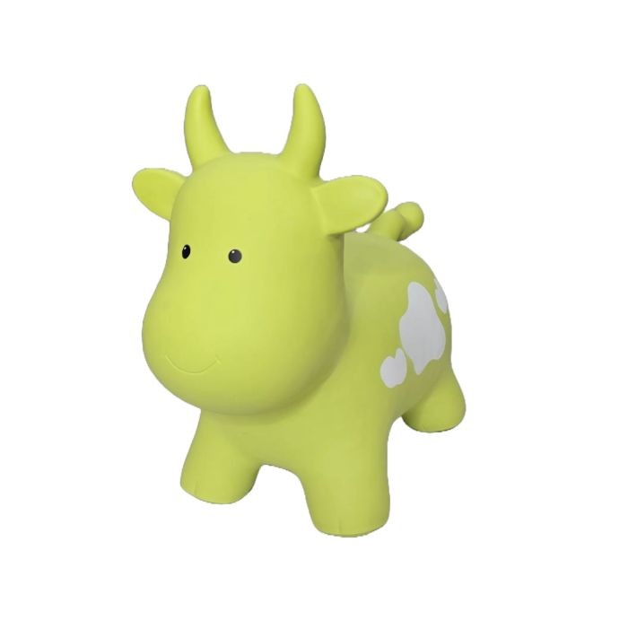 a soft green cow hopper toy for toddlers, sitting gently on a cozy nursery rug