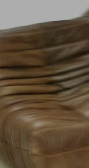 elegant close-up of paradox in a bottle perfume oil on a dark marble surface