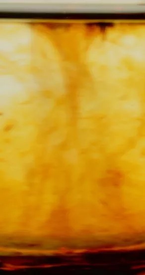 elegant close-up of under the sheets hand cream with warm saffron and sandalwood scent