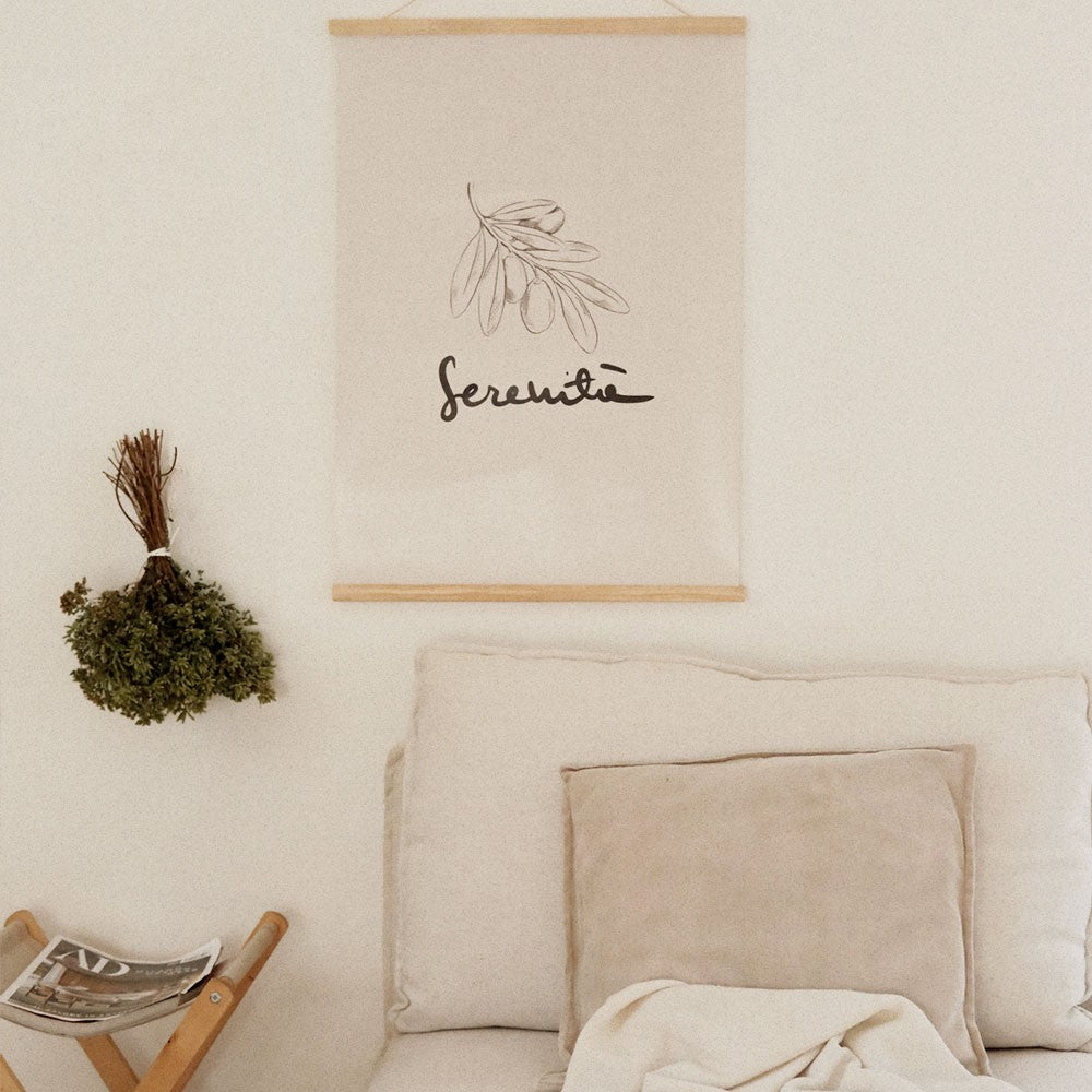 elegant minimalist serenita poster 50x70cm on a textured wall in soft morning light