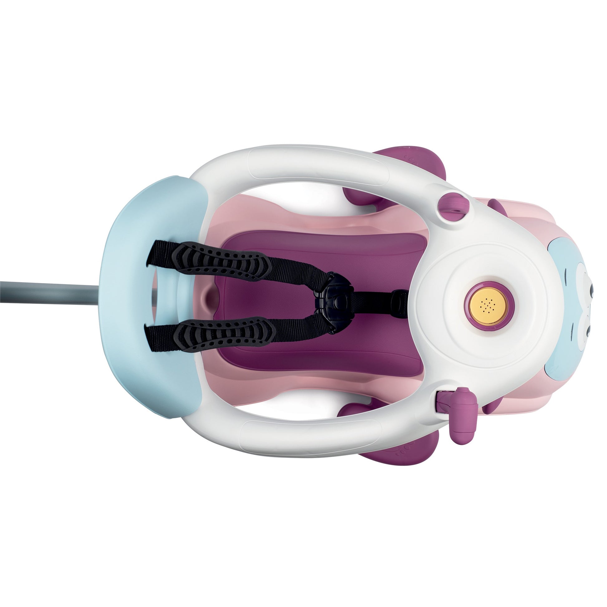 pink maestro 3in1 ride-on toy with glowing eyes and horn in a cozy home playroom