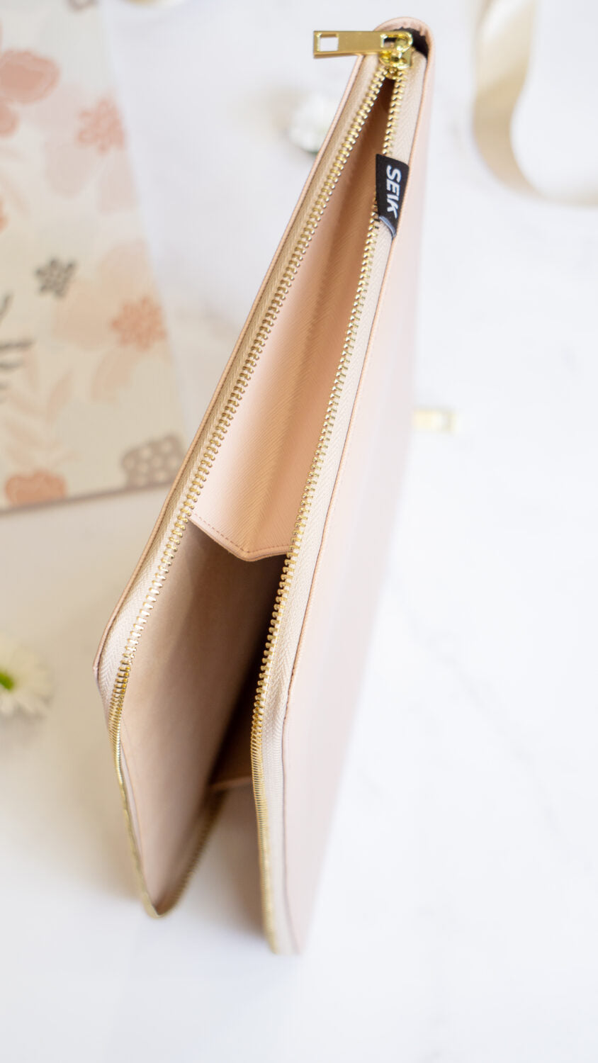 Discover the Elegance in Simplicity with SEIK Laptop Sleeve by SEIK at www.brixbailey.com