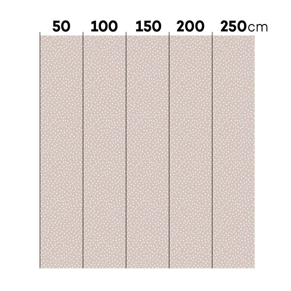 close-up of playful pink and white irregular dots wallpaper texture, like soft raindrops on a nursery wall