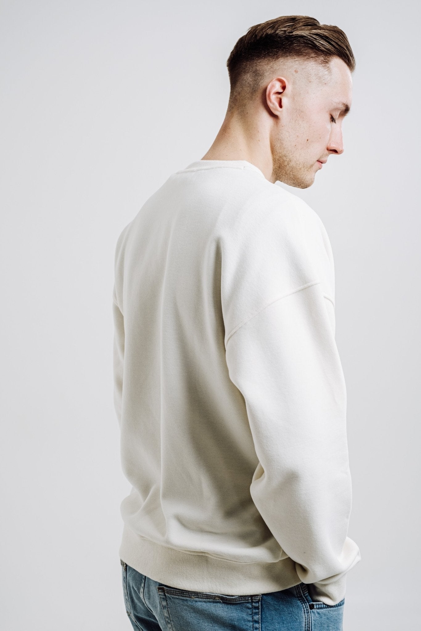 Discover Comfort with Our Unisex Relaxed-Fit Sweatshirt - Eco-Friendly & Stylish by Sossu at www.brixbailey.com