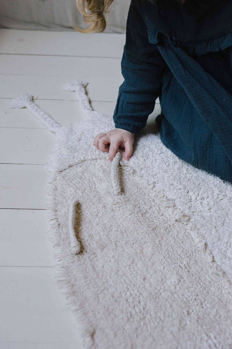 Snail-Shaped Rug in Sage and Natural Tones - Eco-Friendly & Handcrafted for Comfort and Style by Lorena Canals at www.brixbailey.com