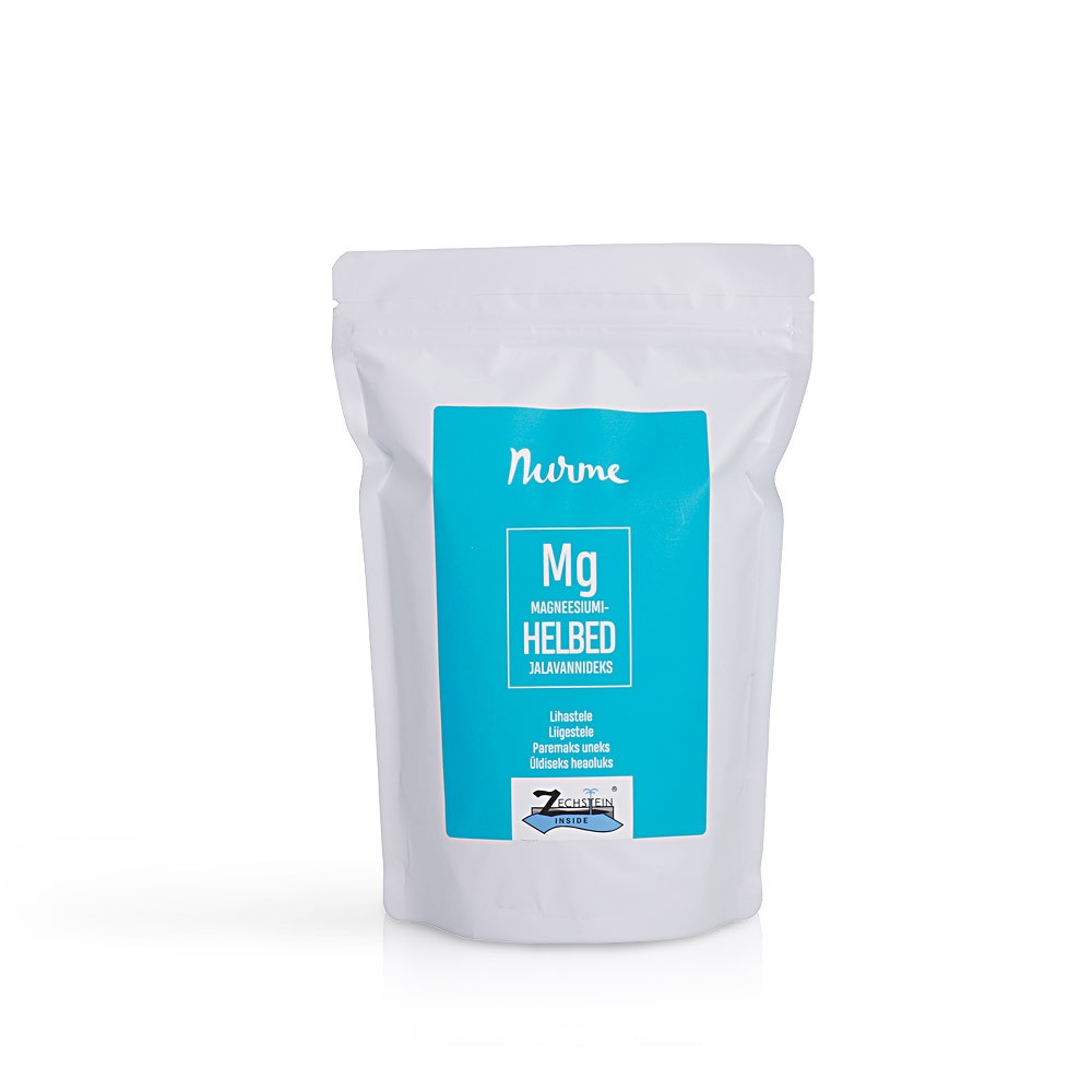 a playful scoop of zechstein magnesium bath flakes sparkling in warm light