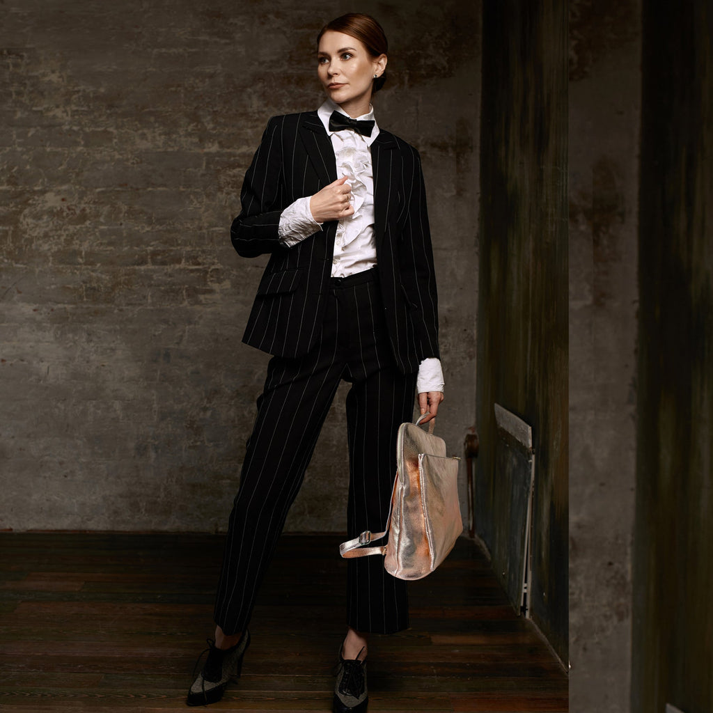 Elegant women's backpacks from independent designers, blending luxury with playful and practical designs