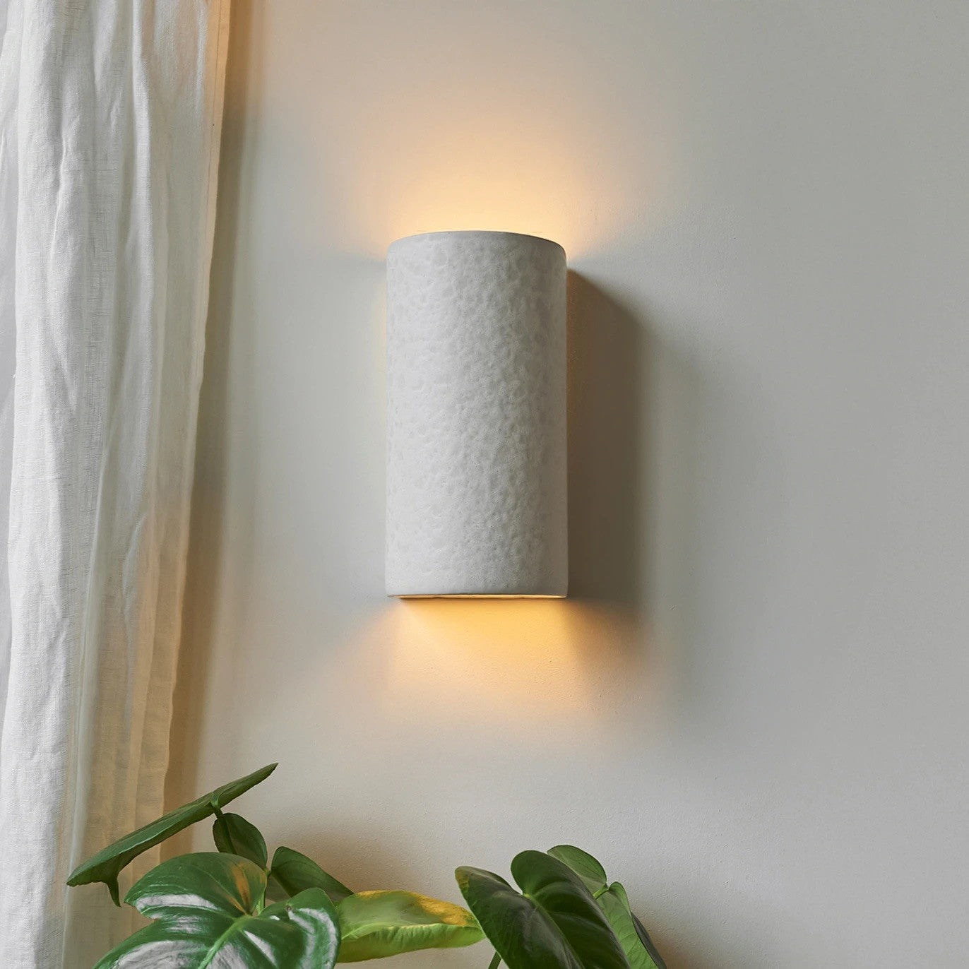 Ora handcrafted ceramic wall lights and sculptural lighting pieces made in small series across Portugal and Luxembourg at Sostter