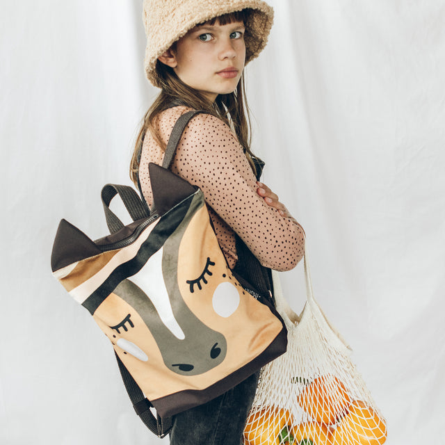 MUNI handmade backpacks inspired by wild nature and urban life, including colorful animal-themed designs for kids
